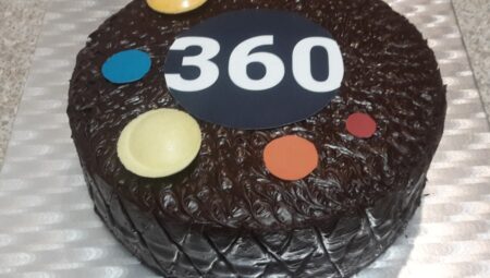 Cake decorated with 360Giving's logo